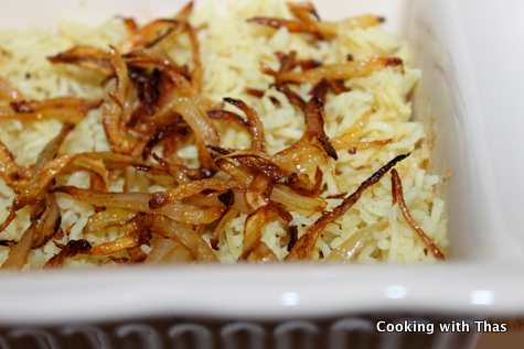 layering fried chicken biryani