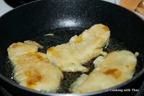 frying plantian fritters