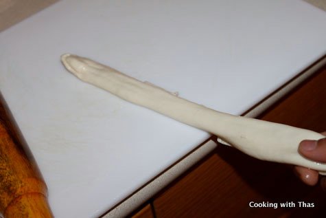 tapping-parotta dough