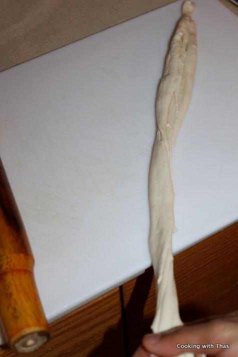 tapping parotta dough
