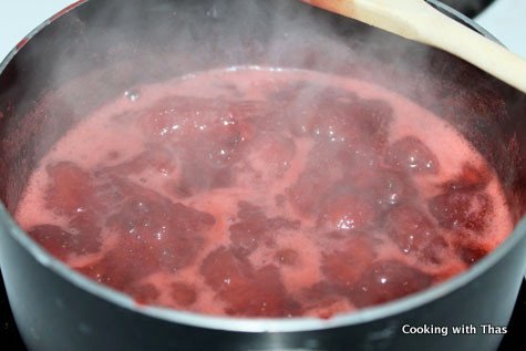 making strawberry filling