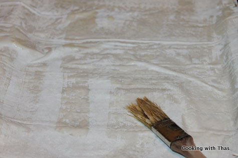 brushing with butter